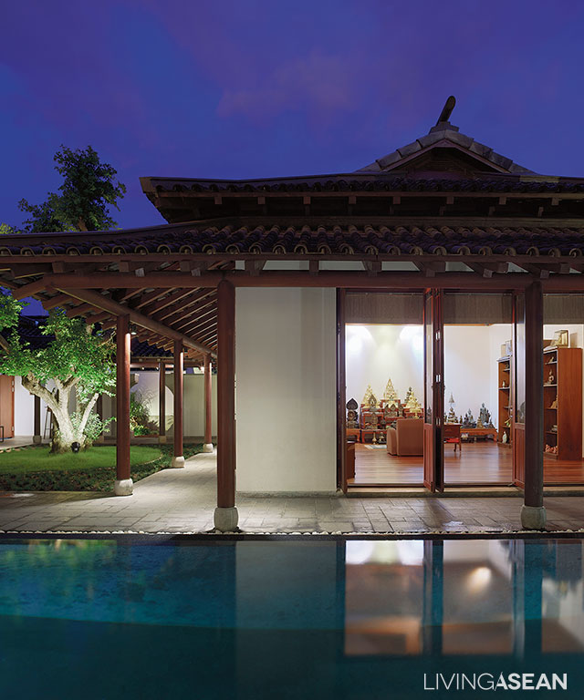 A stand-alone house of Buddha serves as a reminder of Thai architecture in earlier times.