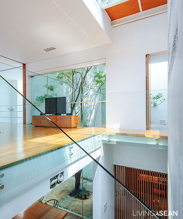 Sunlight streams through the windows turning the stairwell into well-lit place.