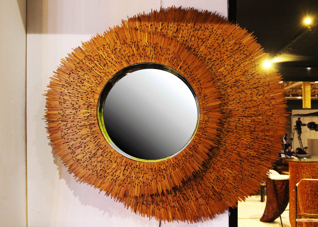 A strikingly beautiful mirror on wooden frame 