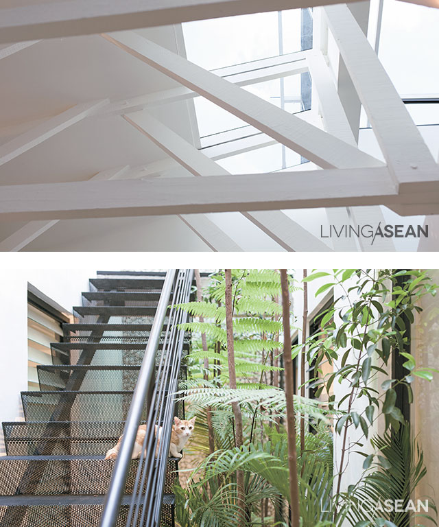[Above] The wooden roof truss painted all white makes the overhead space look taller and more spacious. / [Below] The new metal staircase is aesthetically pleasing, thanks to the absence of solid risers between the treads. For good ventilation, expanded metal grating is used instead. 