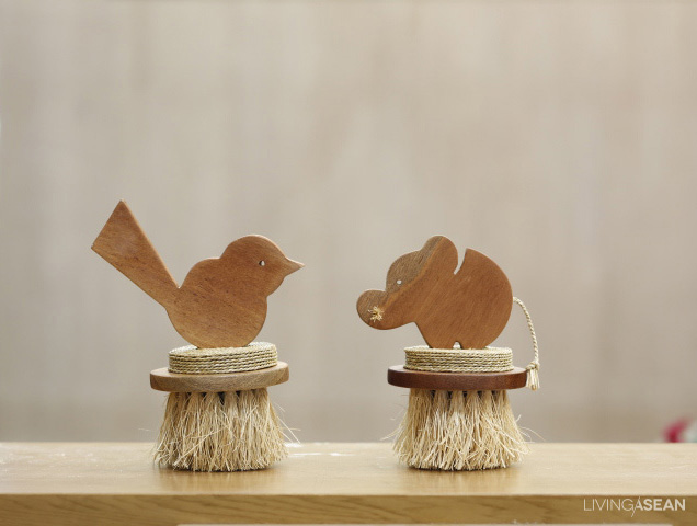 Handy bird and elephant vetiver brushes.