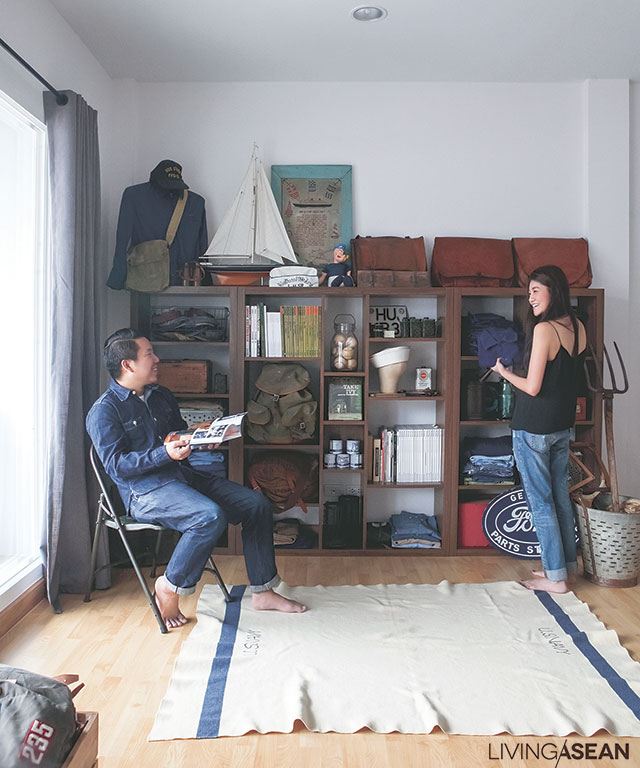The owners with their lovable collection: wooden shelving creates order. 