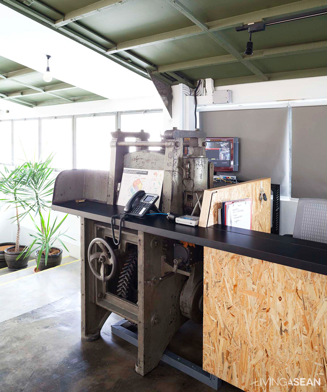 No reception counter, no problem! Use an old printing press instead.