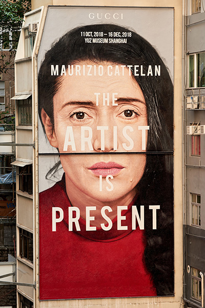 In Hong Kong, a painting of Marina Abramovic for a Gucci art wall promoting “The Artist Is Present” event I Photo taken by Ronan Gallagher, inspired by the original taken by Marco Anelli I Courtesy of Gucci