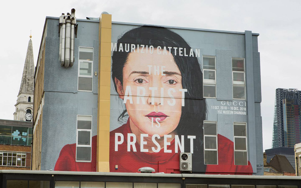 In London, a painting of Marina Abramovic for a Gucci art wall promoting “The Artist Is Present” event I Photo taken by Ronan Gallagher, inspired by the original taken by Marco Anelli I Courtesy of Gucci