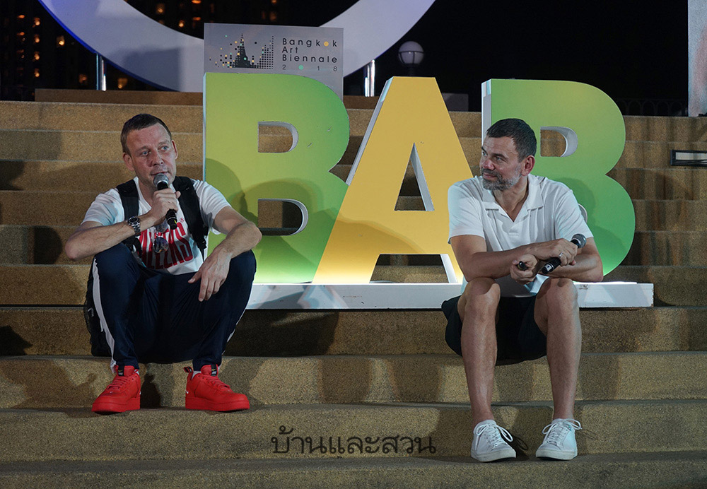 On the steps of the exhibition platform, Michael Elmgreen (left) and Ingar Dragset take turns sharing the inspiration and experience that culminates in “Zero” at the 20th BAB Talk.