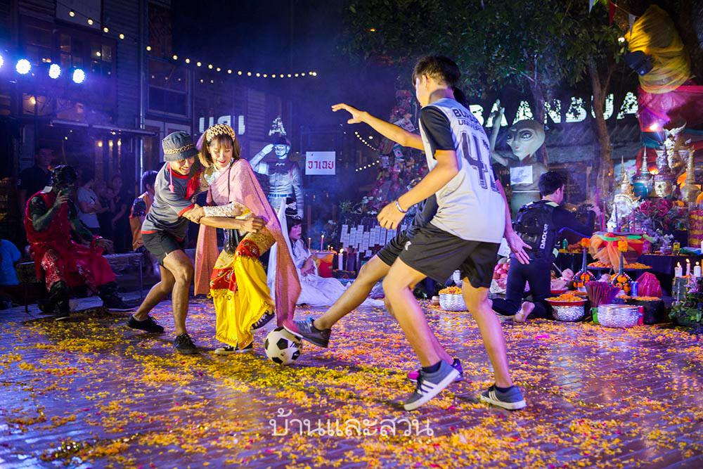  Young footballers kicking the ball, waiting for help from a SCUBA diver