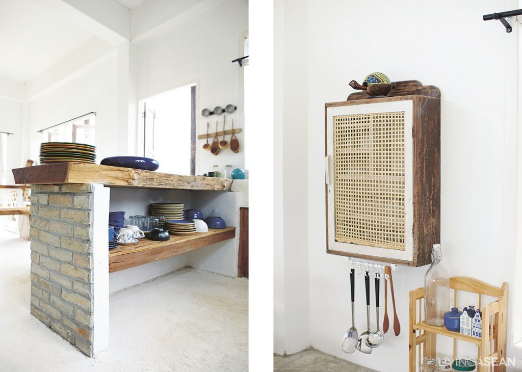 [Left] The kitchen countertop and lower shelf made of hand-hewn wood slabs add a rustic appeal to the interior. [Right] A medicine cabinet is made of reclaimed wood. The homeowner had her neighbor make the woven bamboo cabinet door for her, a design inspired by her Mom, who in turn got the idea from a vintage hotel in Luang Prabang, Laos PDR. The house is mainly white because Fasai wanted it to feel light and airy inside and out.