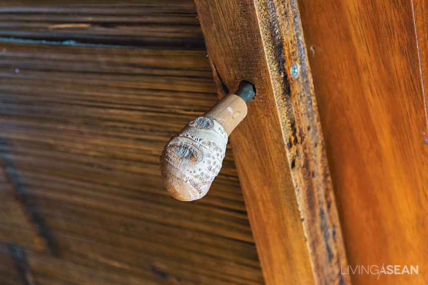 Even the doorknob is crafted of a bamboo gnarl.
