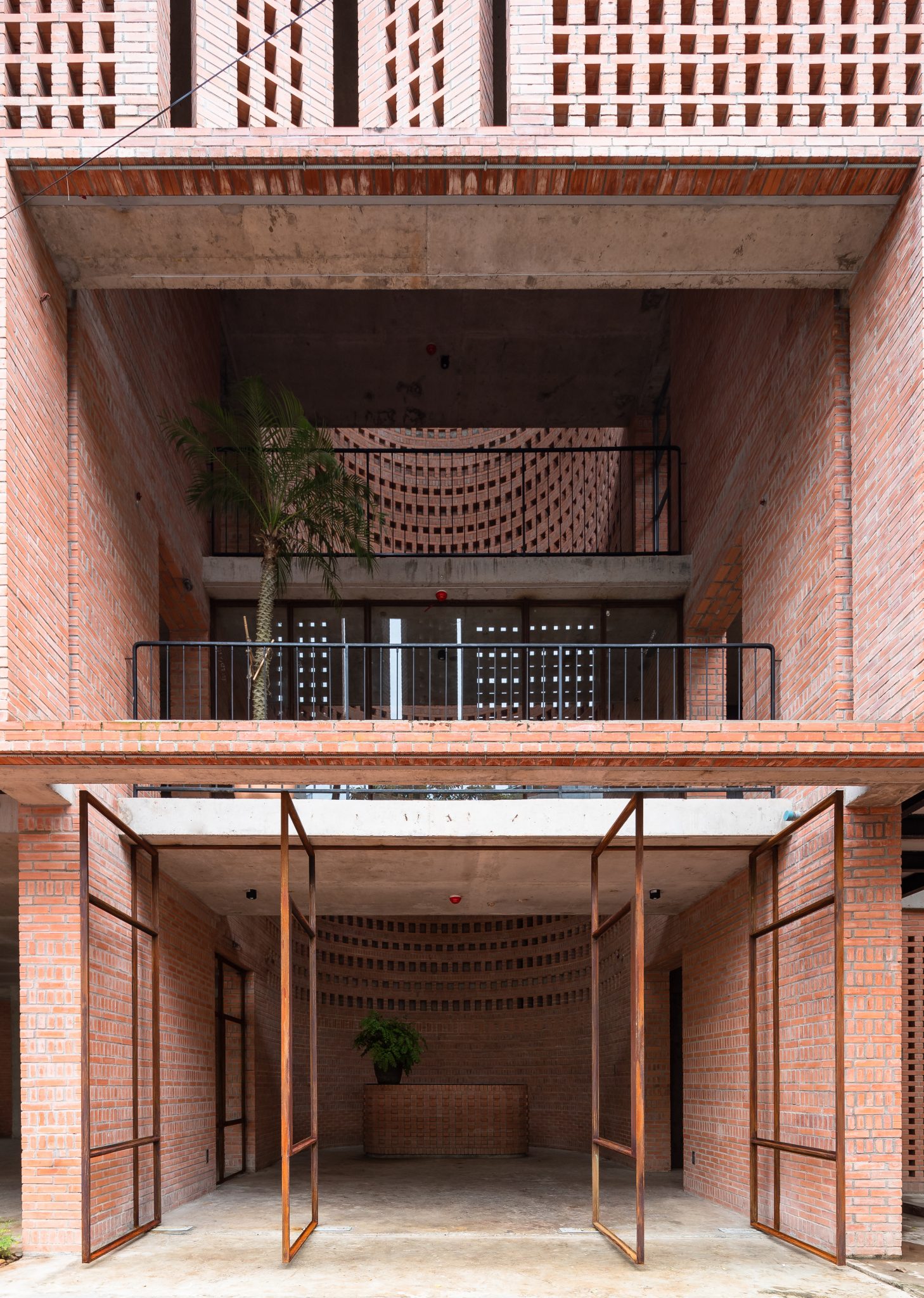 Premier Office: A Nature-Inspired Brick Office Design / Living Asean