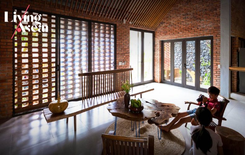 TB House: A One-Story Brick Home and Green Leaves of Summer at Every Turn