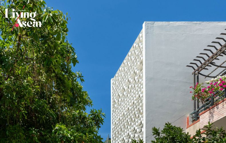 A White Row House Enchanted by Greenery and Natural Light