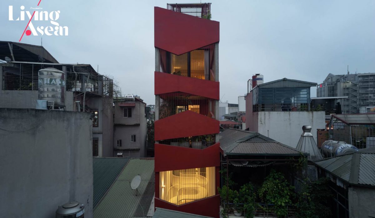 http://A%20Red-Facade%20House%20Stands%20Tall%20in%20the%20Fresh%20Air%20and%20Sunshine