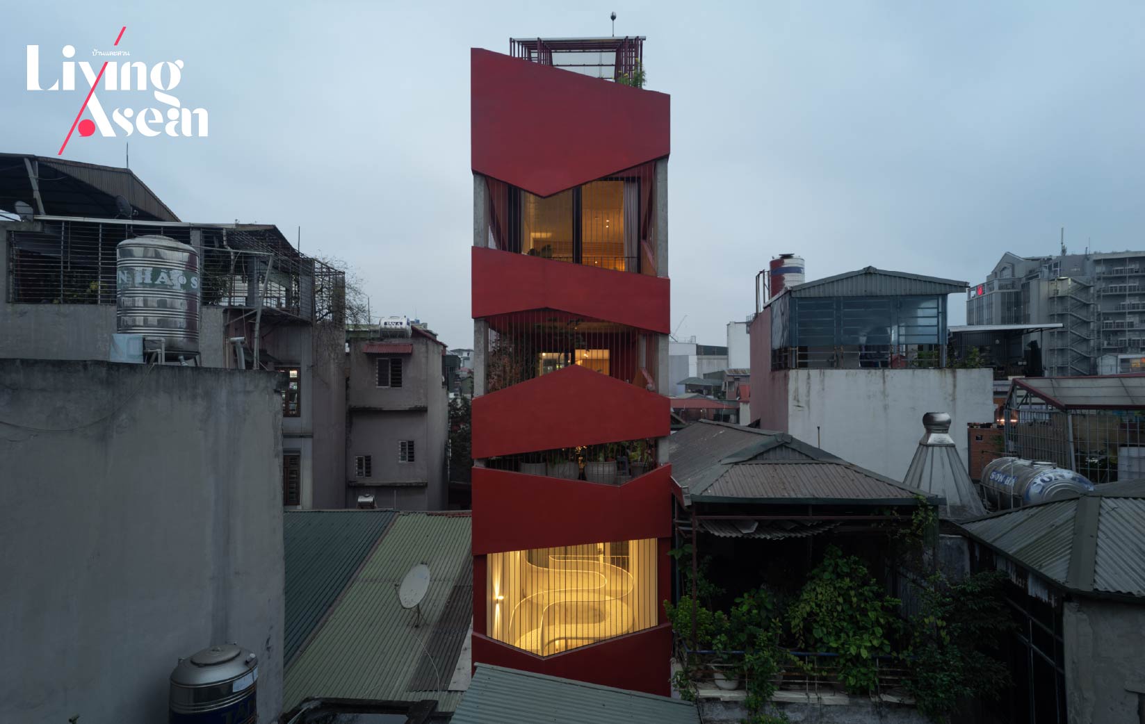 A Red-Facade House Stands Tall in the Fresh Air and Sunshine