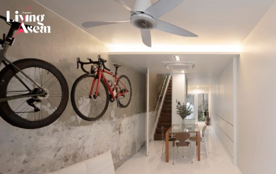 A White Home on a Narrow Street with Full Functionality